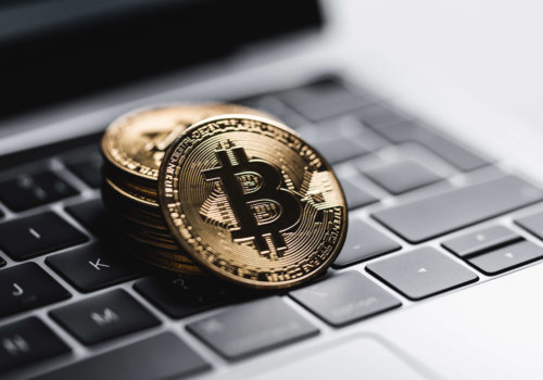 gold-bitcoin-coins-on-laptop-keyboard-picjumbo-com.jpg